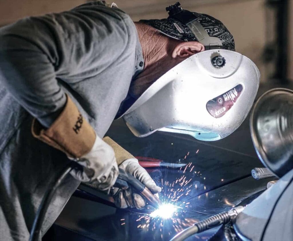 Car-repair-mechanic-welding-ColuccioLaw-Seattle