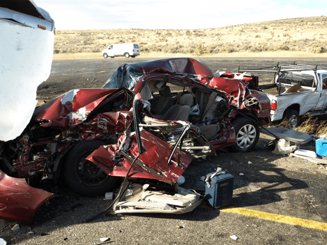 Multi-vehicle-semi-truck-collision-wrecked-car