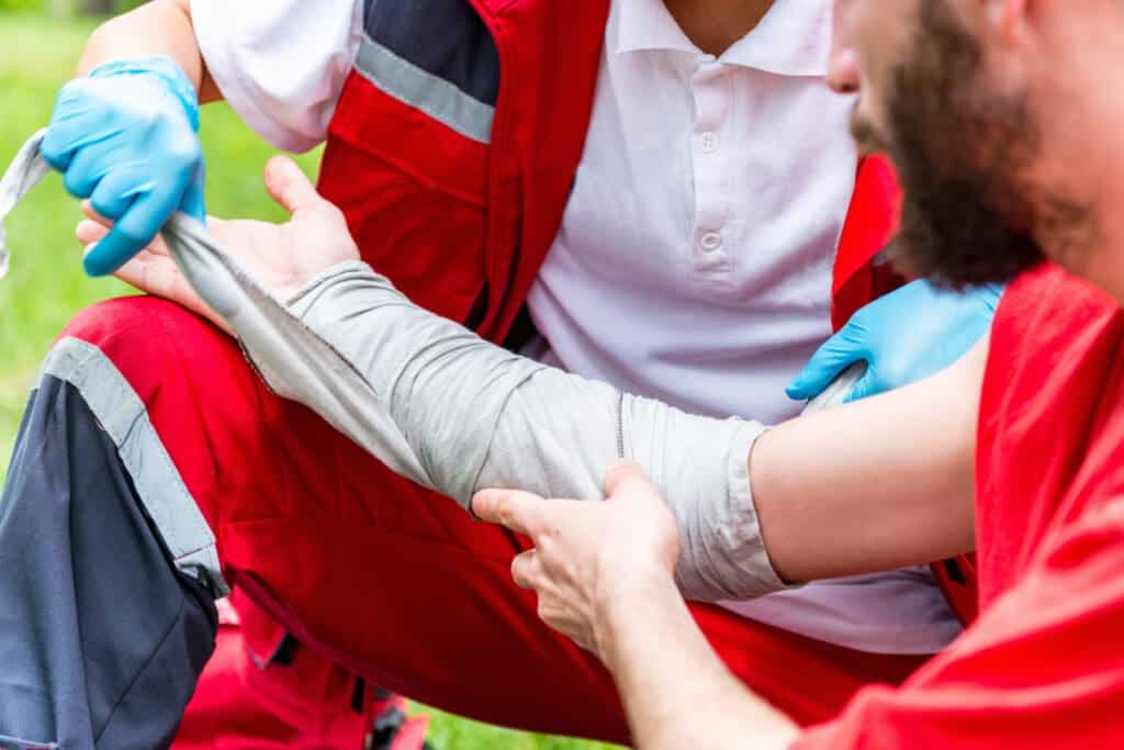 Medical professional treating burn victim